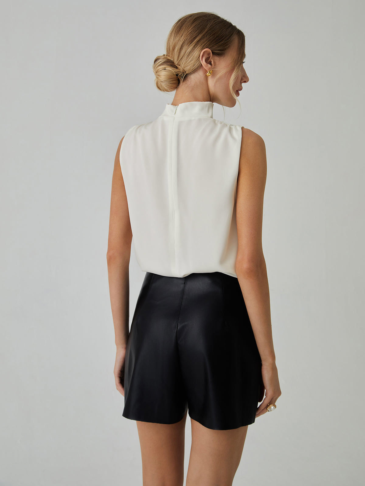 Pleated Sleeveless Blouse with High Neck