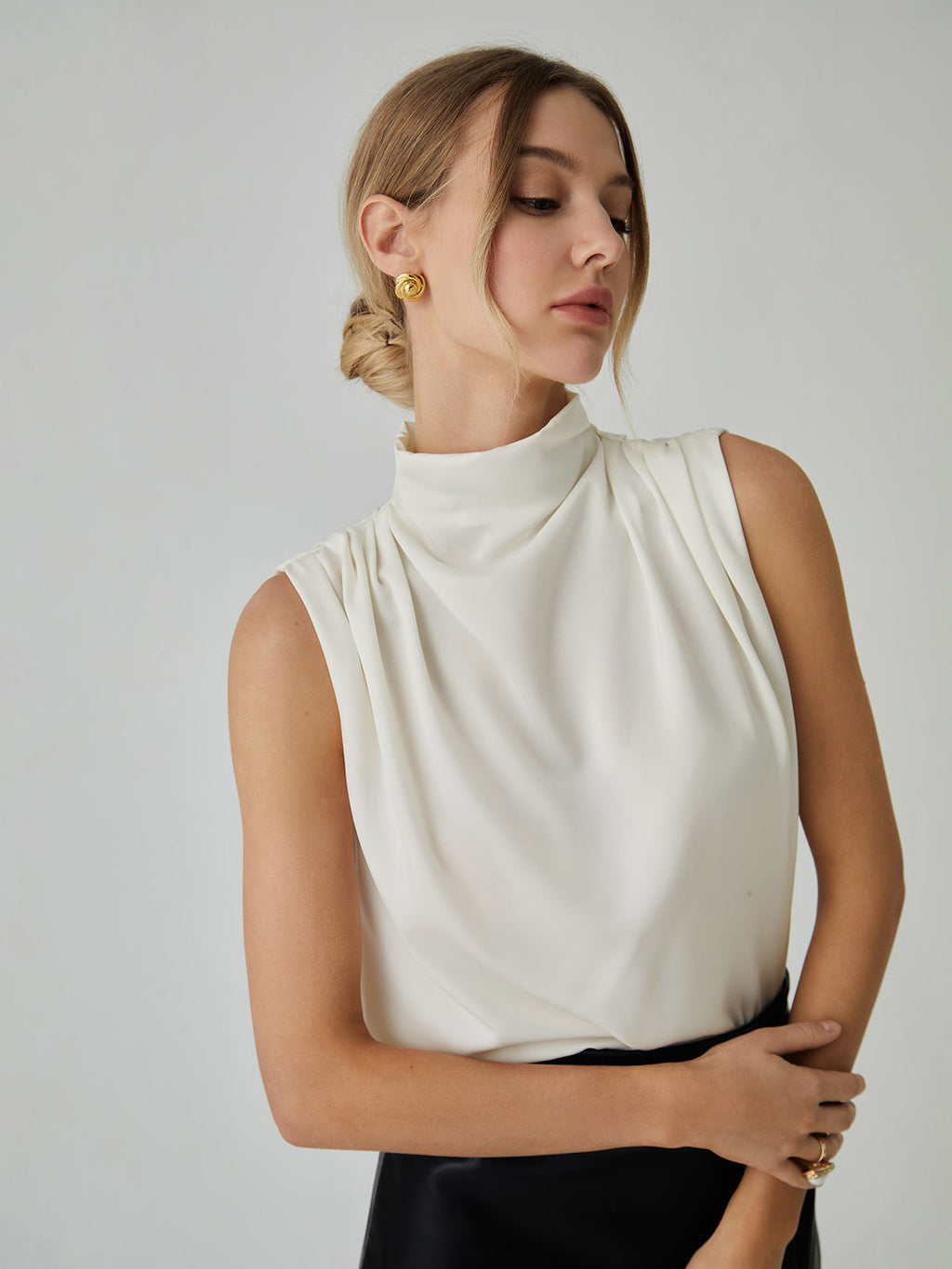 Pleated Sleeveless Blouse with High Neck